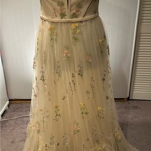 Cream colored beautiful tulle formal gown. Never worn or altered.